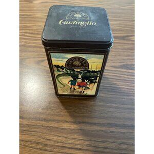 Cadbury tin full of vintage sewing accessories